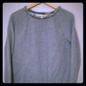 CALVIN KLEIN WOMEN'S SWEATSHIRThas a tear drop hol